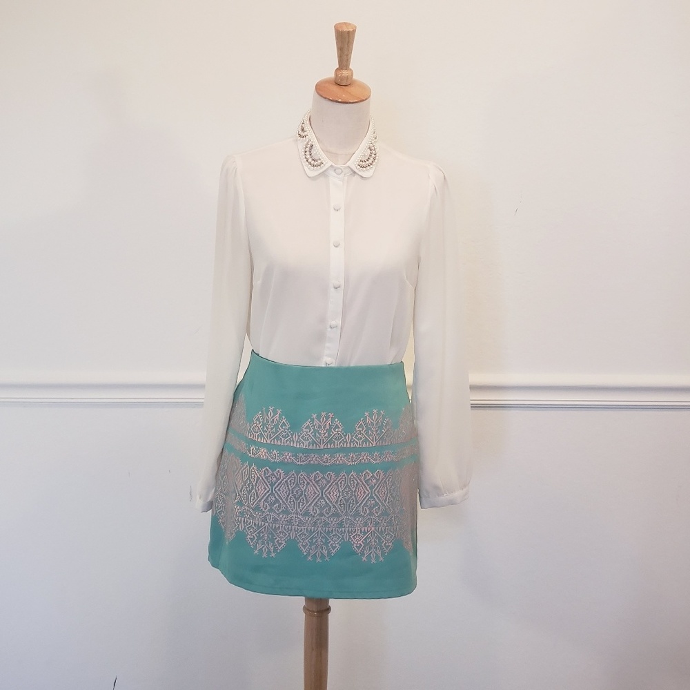 Beautiful blouse with pearls design on collar